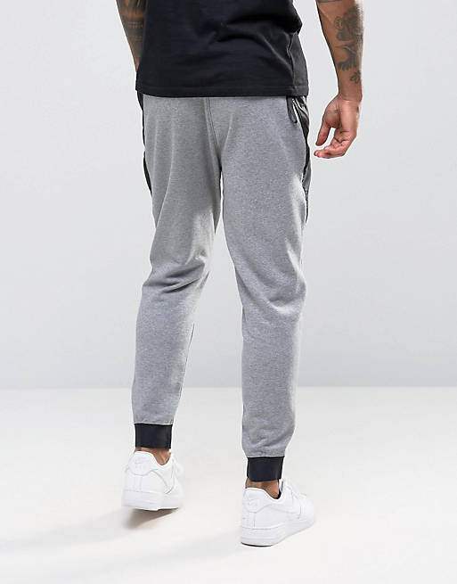 Pantalones chándal pitillo grises International 802375-091 de Nike | ASOS