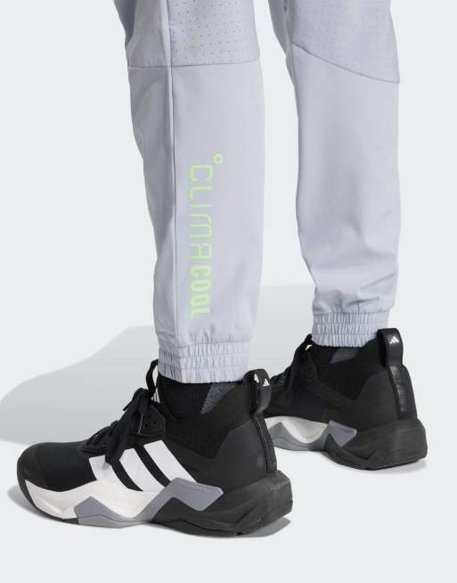 Pantalones de chándal plateado halo y verde neón Tech Apparel de adidas Performance, 4 de 5