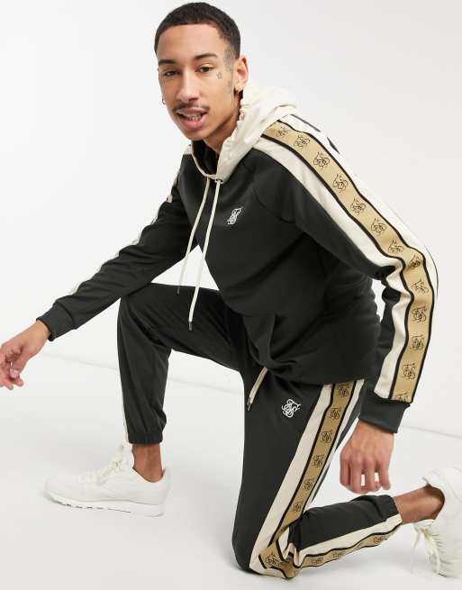 Conjunto de chándal blanco y negro con detalle de banda de SikSilk | ASOS