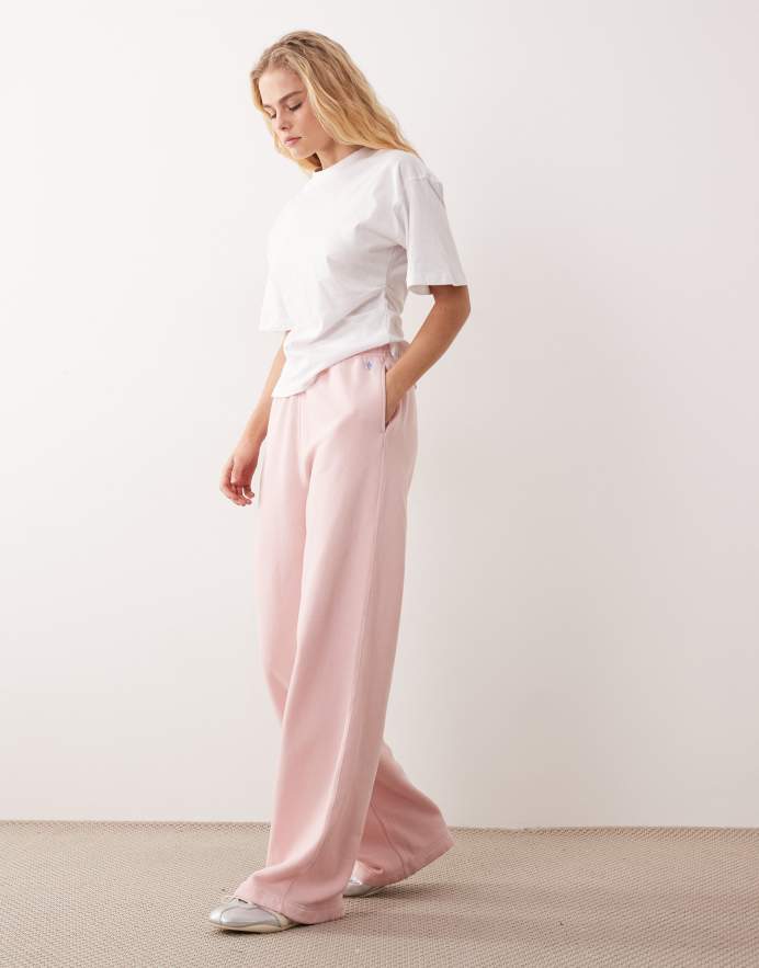 Polo Ralph Lauren Pantalones de chándal rosas de pernera ancha con logo de icono de felpa de