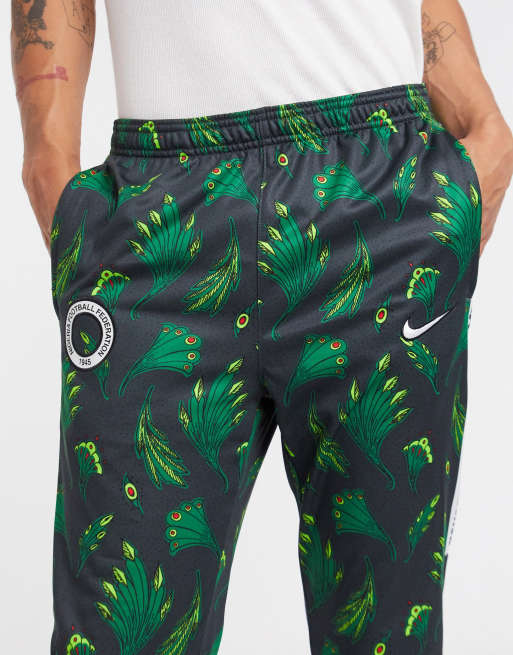 léxico mueble Prehistórico Pantalones de chándal verdes de Nigeria de Nike Football | ASOS