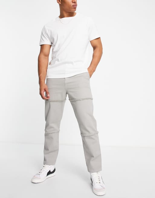 Pantalones de corte skater con lavado ácido y acabado desgastado de ASOS DESIGN