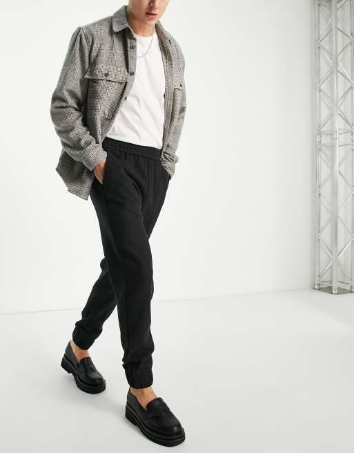 Pantalones de corte slim con cinturilla ancha elástica de Harry Brown