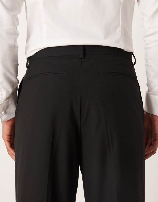 Pantalones de esmoquin negros de pernera ancha de ASOS DESIGN, 4 de 5
