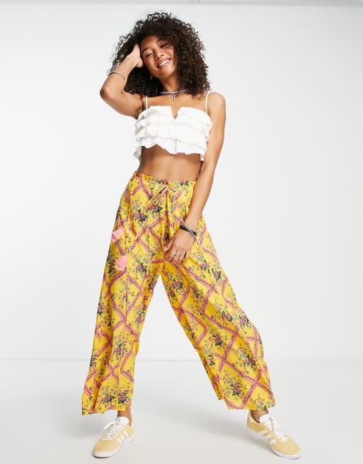 Pantalones de estar por casa amarillos estampados I'm the one de Free People 