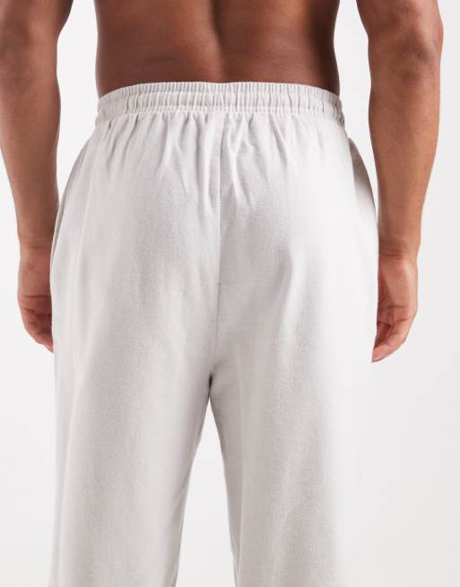 Pantalones de estar por casa blanco marfil de tejido cepillado de ASOS DESIGN, 4 de 4