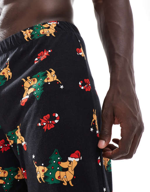 Pantalones de estar por casa negros con estampado de perros salchicha de Navidad de ASOS DESIGN, 3 de 4
