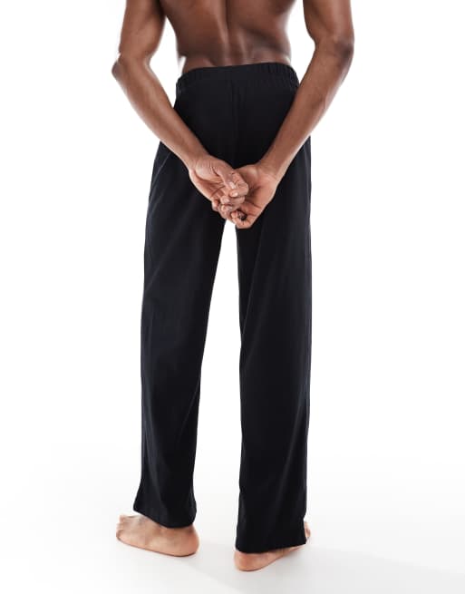 Pantalones de estar por casa negros de punto liso de ASOS DESIGN, 2 de 4