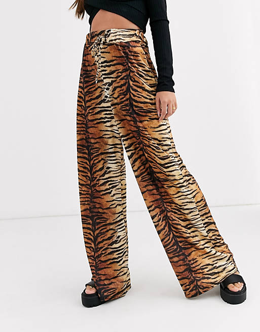 Economía Peregrino interfaz Pantalones de pernera ancha con estampado de tigre de New Girl Order | ASOS