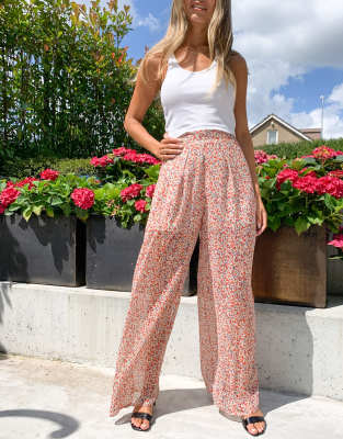 Pantalones de pernera ancha con motivo rojo de New Look-Negro