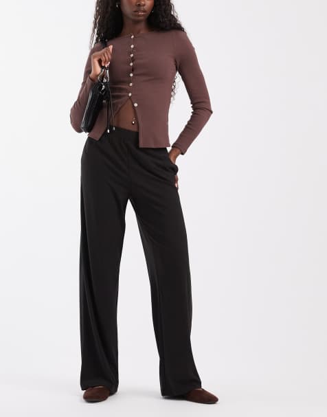Pantalones de pernera ancha de cintura alta en negro - view 1
