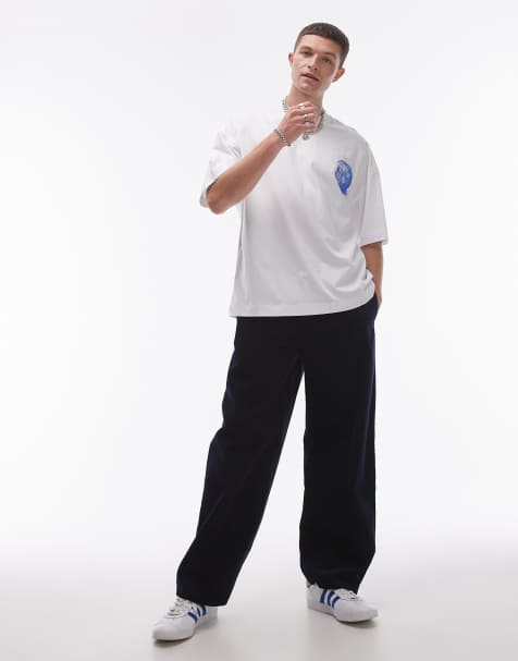 Pantalones de pernera ancha en pana azul marino de Topman - view 1