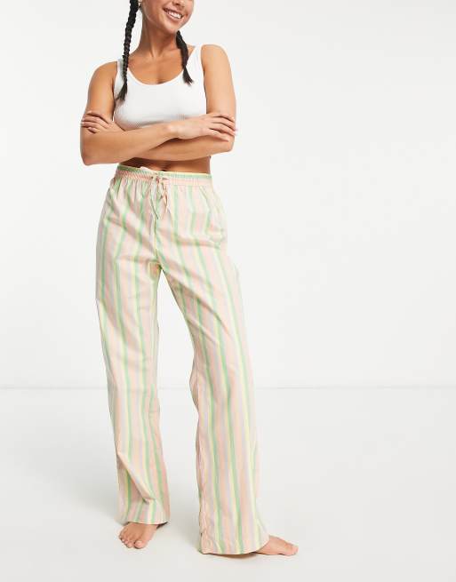 Pantalones de pijama a rayas multicolores de Monki (parte de un conjunto)