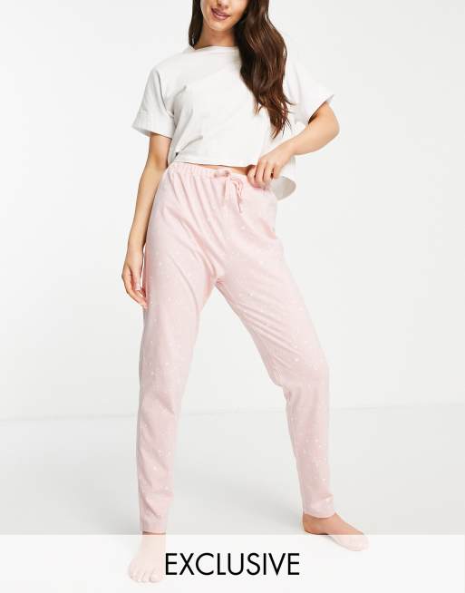 Pantalones de pijama rosas con estampado de estrellas y cordón ajustable de algodón de People Tree (parte de un conjunto)
