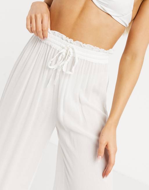 Pantalones de playa blancos con cordón ajustable exclusivos de Iisla & Bird , 3 de 4