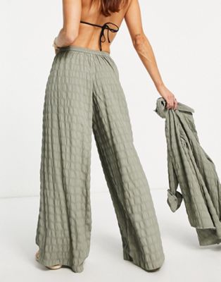 Pantalones playeros verdes de pernera ancha texturizados exclusivos de  Esmée (parte de un conjunto) 