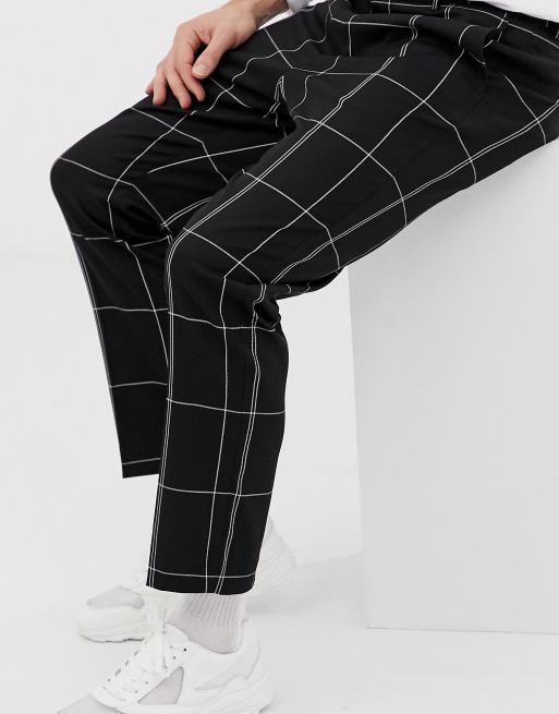 Pantalon negro cuadros blancos new arrivals