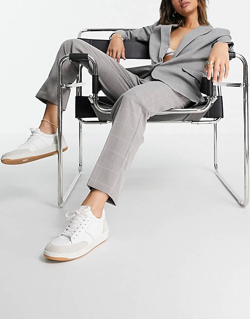 Pantalones de sastre a cuadros grises de pernera recta con cinturilla elástica y bajos vueltos de Y.A.S