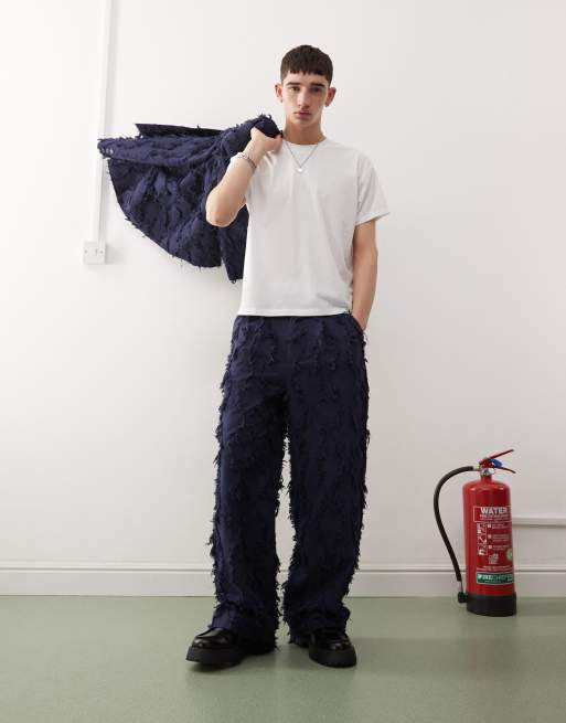 Pantalones de sastre azul marino con diseño deshilachado de Reclaimed Vintage (parte de un conjunto)