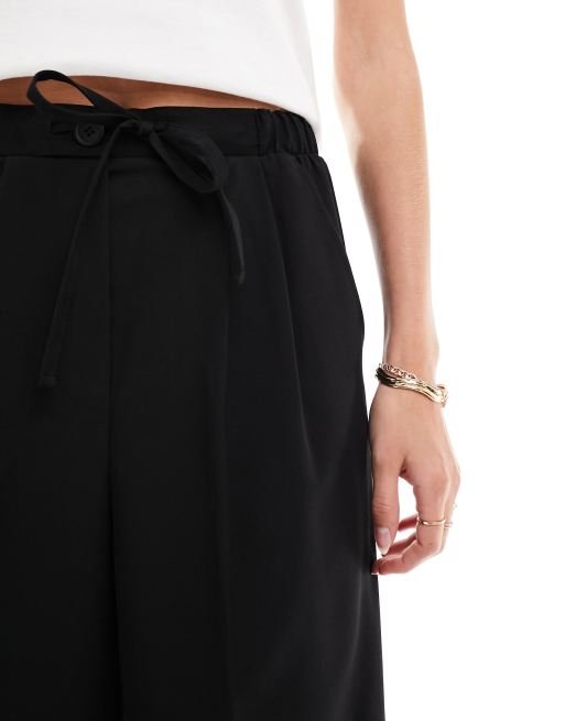 Pantalones de sastre negros sin cierres de ASOS DESIGN Tall, 5 de 5