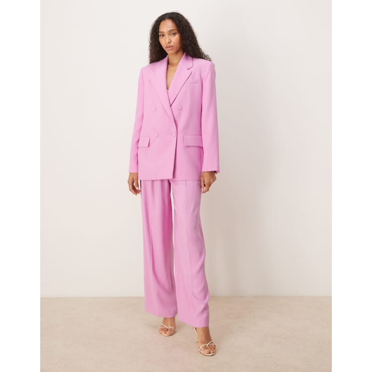 Pantalones de sastre rosa claro con pinzas delanteras de Mango