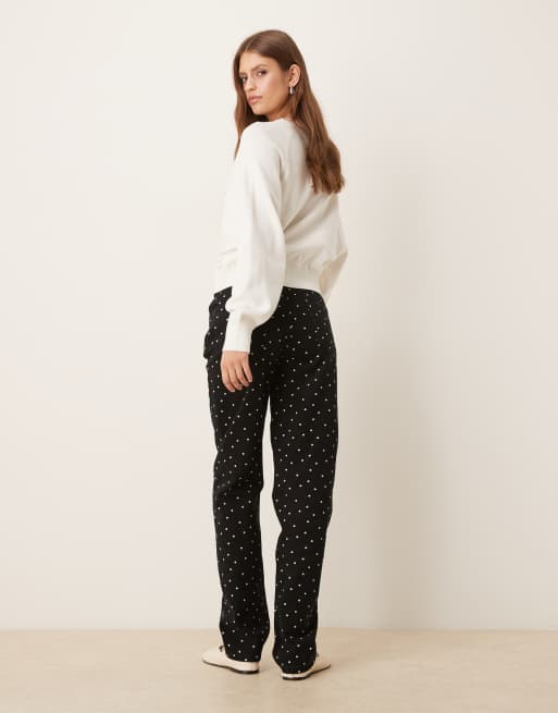 Pantalones de talle medio y pernera slim con estampado de lunares de ASOS DESIGN, 3 de 5