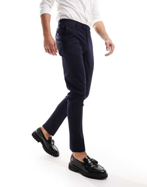 Pantalones de traje azul marino de corte pitillo con raya diplomática de Gianni Feraud