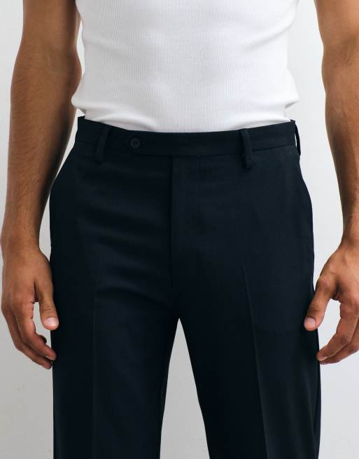 Pantalones de traje azul marino oscuro de corte tapered de ASOS DESIGN, 4 de 5