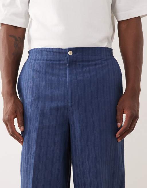 Pantalones de traje azules a rayas de corte tapered extragrande de mezcla de lino de ASOS DESIGN, 4 de 5