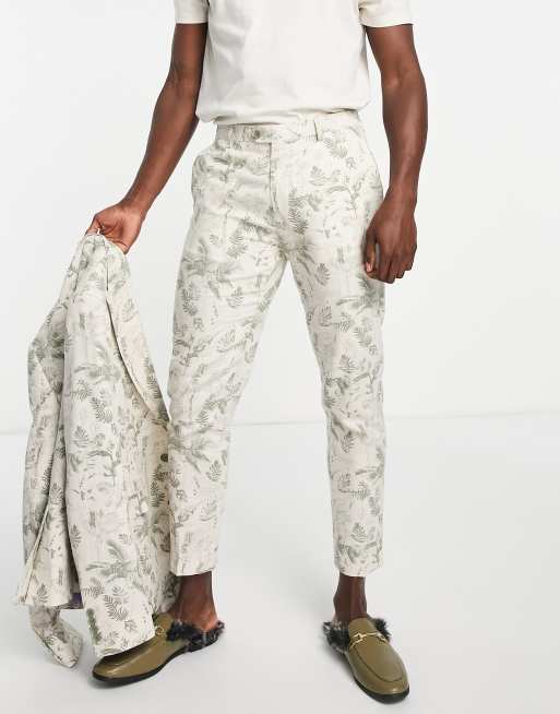 Pantalones de traje capri de corte pitillo con estampado floral verde de Gianni Feraud
