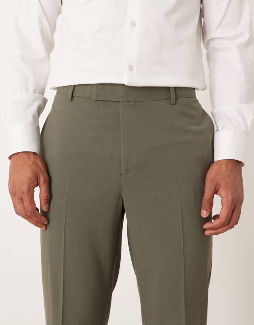 Pantalones de traje caquis de corte tapered de ASOS DESIGN, 4 de 5