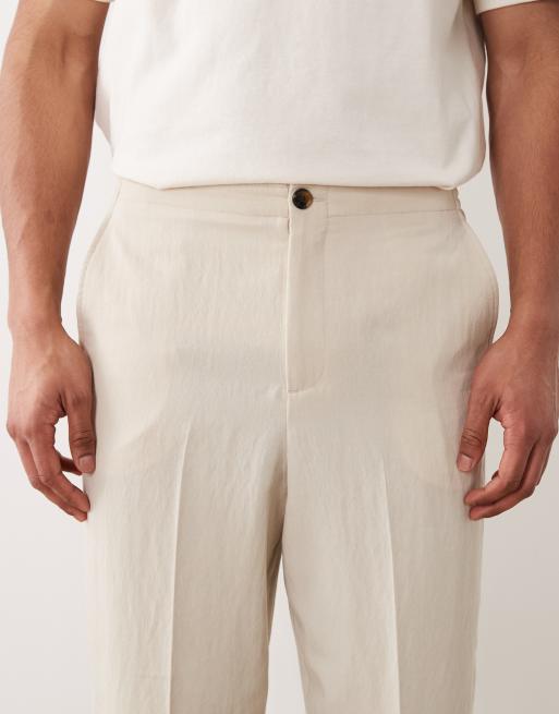 Pantalones de traje color crema de corte tapered holgado de ASOS DESIGN, 5 de 5