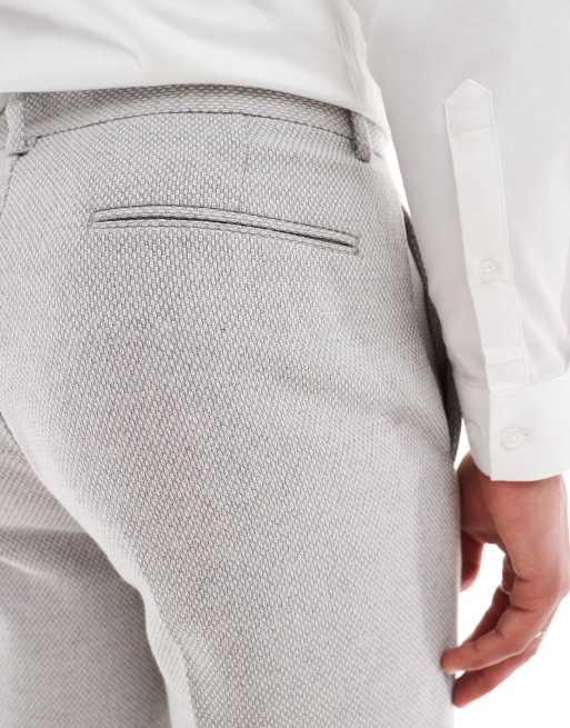 Pantalones de traje grises de corte tapered de tejido con lana de ASOS DESIGN, 4 de 5