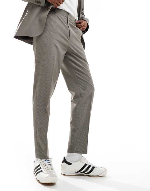 Pantalones de traje marrones de corte tapered con estampado de