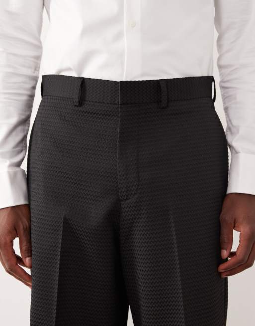 Pantalones de traje negros de corte ancho de jacquard de ASOS DESIGN, 4 de 5