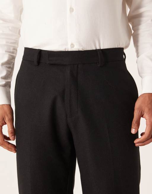Pantalones de traje negros de corte estándar de tejido con lana de ASOS DESIGN, 4 de 5
