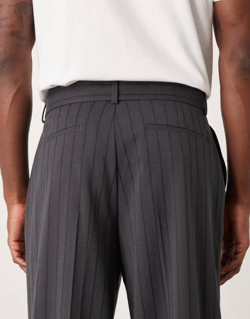 Pantalones de traje negros de corte suelto de ASOS DESIGN, 4 de 5