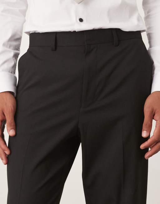 Pantalones de traje negros de corte tapered de ASOS DESIGN, 4 de 5