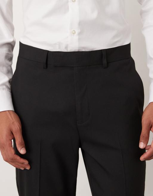 Pantalones de traje negros de corte tapered de ASOS DESIGN, 5 de 5
