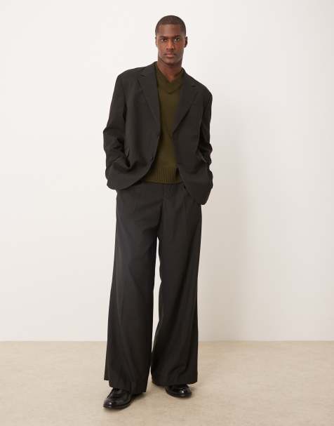 Pantalones de traje negros de pernera suelta con pinzas de ASOS DESIGN - view 1