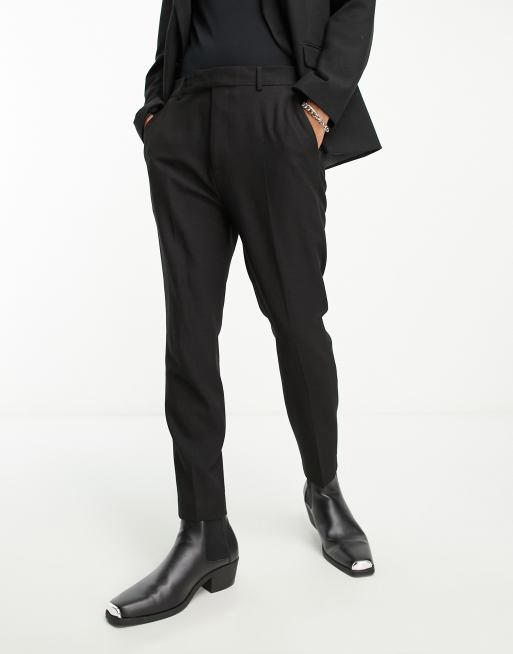 Pantalones de traje negros efecto purpurina de corte tapered de ASOS DESIGN