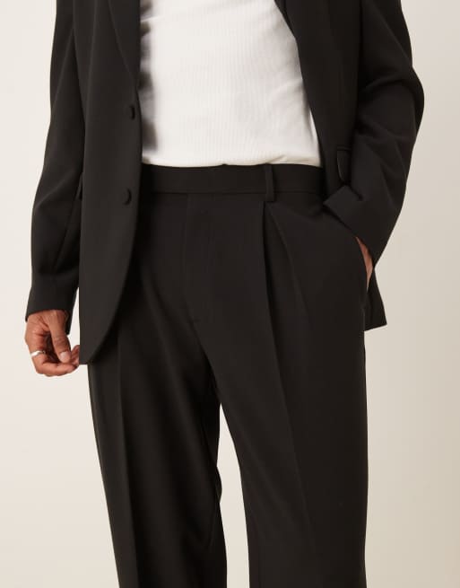 Pantalones de traje negros extragrandes de corte tapered de ASOS DESIGN, 2 de 5