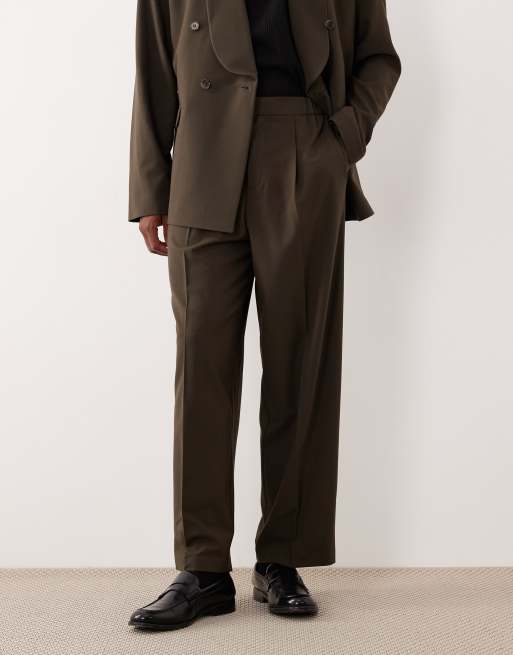 Pantalones de traje verde oliva de corte abombado con cinturilla elástica de ASOS DESIGN, 2 de 5