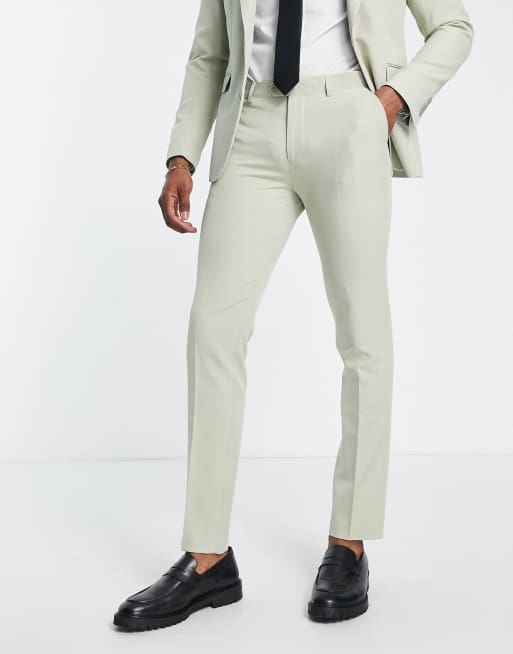 Pantalones de traje verdes de corte pitillo de Gianni Feraud