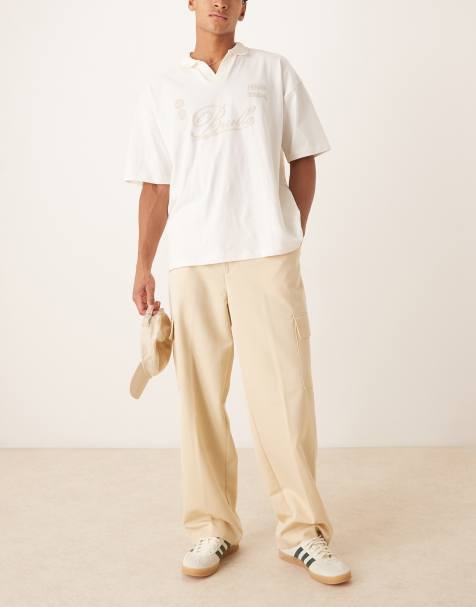 Pantalones de vestir amarillo pastel cargo sin cierres de pernera ancha con pinzas delanteras de ASOS DESIGN - view 1