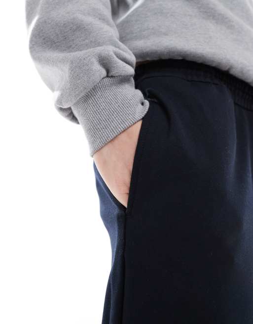 Pantalones de vestir azul marino de corte tapered con cordón ajustable de Jack & Jones, 4 de 5