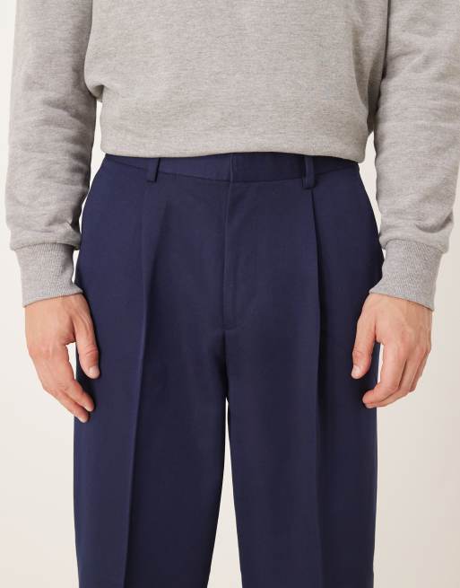 Pantalones de vestir azul marino de corte tapered extragrande de ASOS DESIGN