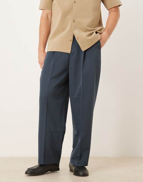 Pantalones de vestir azul oscuro de corte globo con pinzas delanteras de ASOS DESIGN - view 1
