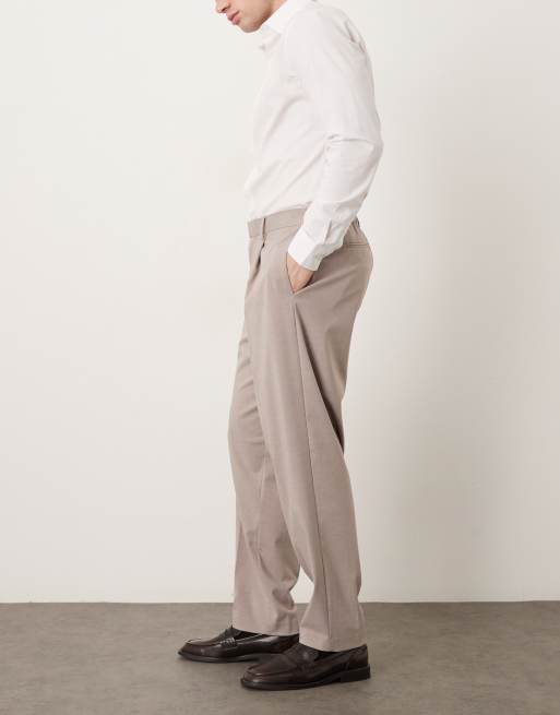 Pantalones de vestir beis de corte tapered holgado con cinturilla elástica de ASOS DESIGN, 3 de 5