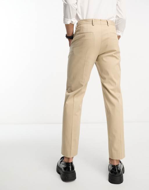 Pantalones de vestir color crema de corte suelto con pliegues delanteros de mezcla de algodon de Selected Homme